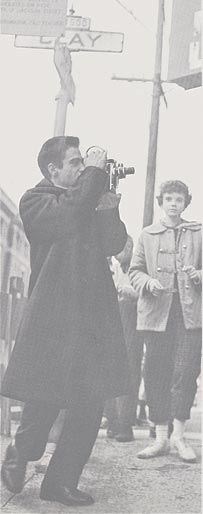 Man with Paillard Bolex H-16 camera